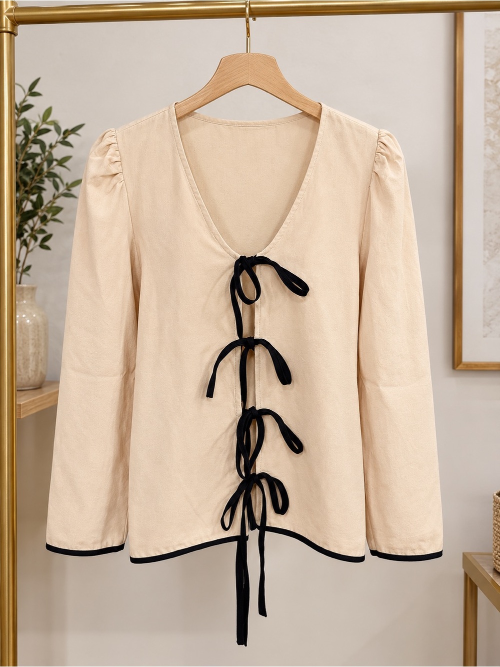 Cream V-Neck Blouse with Black Tie Front